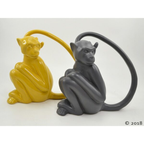 statue singe gris jaune